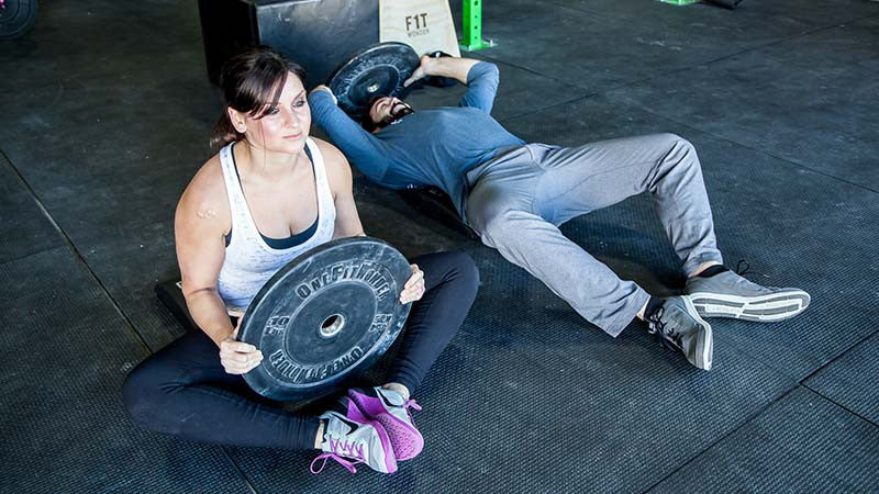 5 Ways To Utilize Your Bumper Plates (Without a Barbell)